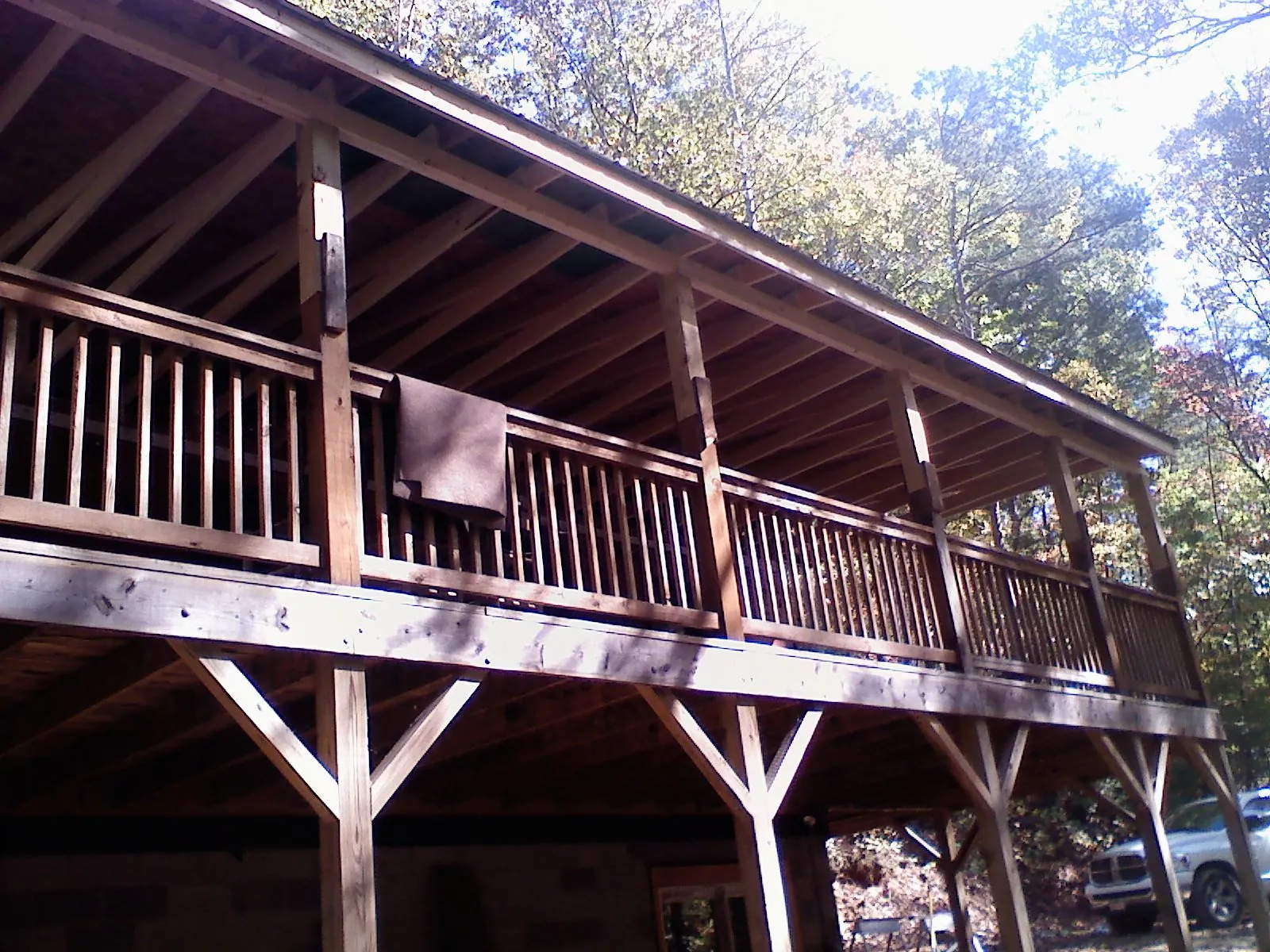 Timber framing under a new elevated porch and deck — Roof Leak Repair in Blandinsville by Roofing Brothers